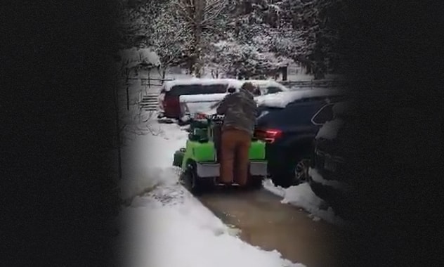 gentleman riding SG Snowplow Kit machine
